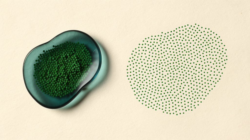 A dense cluster of green dots held tightly inside a translucent teal dish on the left, and the same number of green dots spread loosely with no container on the right: a hormone held in transport versus released free to act.