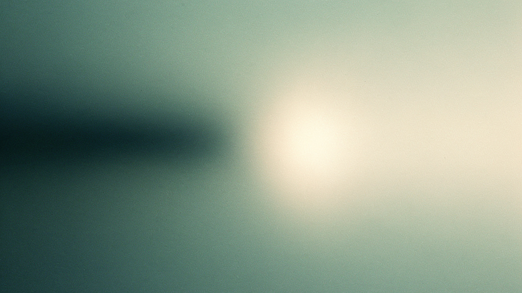 A smooth gradient moving from deep teal night into bright bone daylight with a single soft bloom of light at the break, evoking the 24-hour cycle and the morning light that anchors the body's clock.