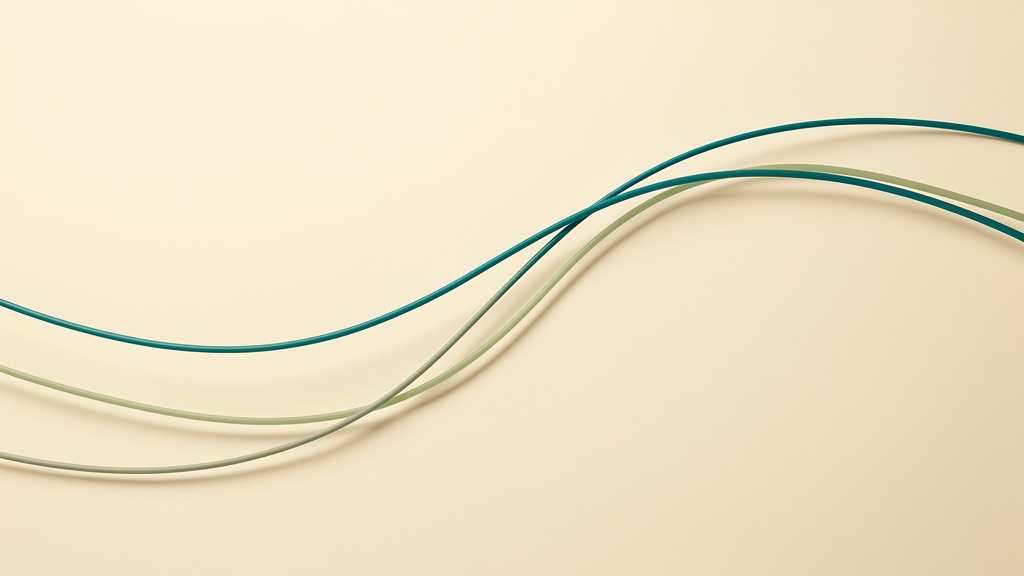 One clear teal line joined by two or three quieter sage and matcha-green companions, separate readings settling into a single fuller shape.