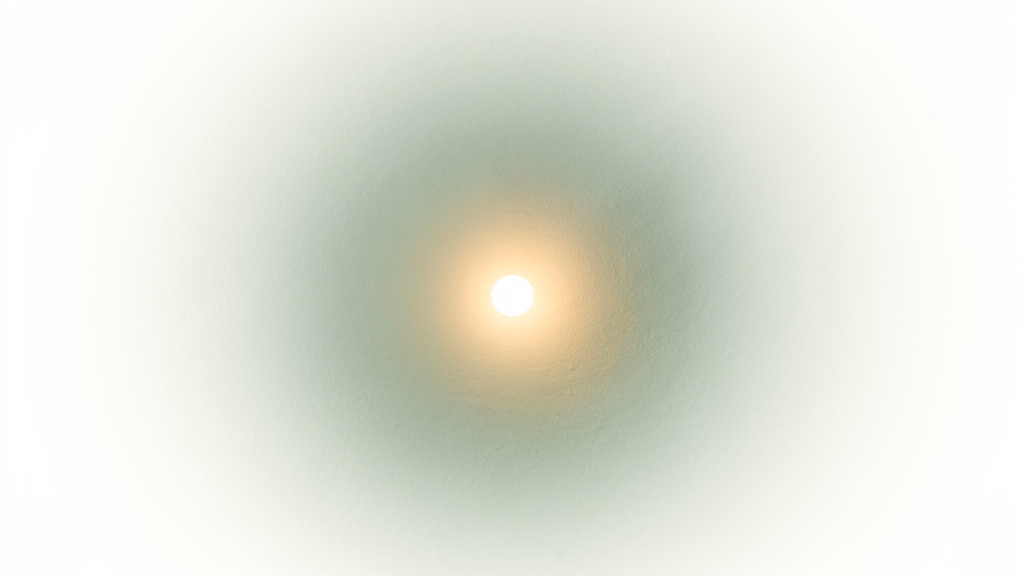 A single warm point of light in a soft bone-white field, a faint matcha-to-teal glow spreading gently outward from its center.